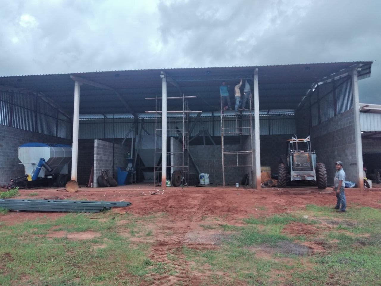 Interior of the feed mill building with storage bays for grain and supplements.