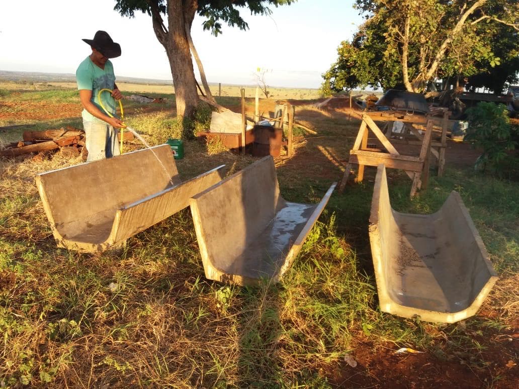 Precast concrete feed bunks being fabricated and positioned for the feeding areas.