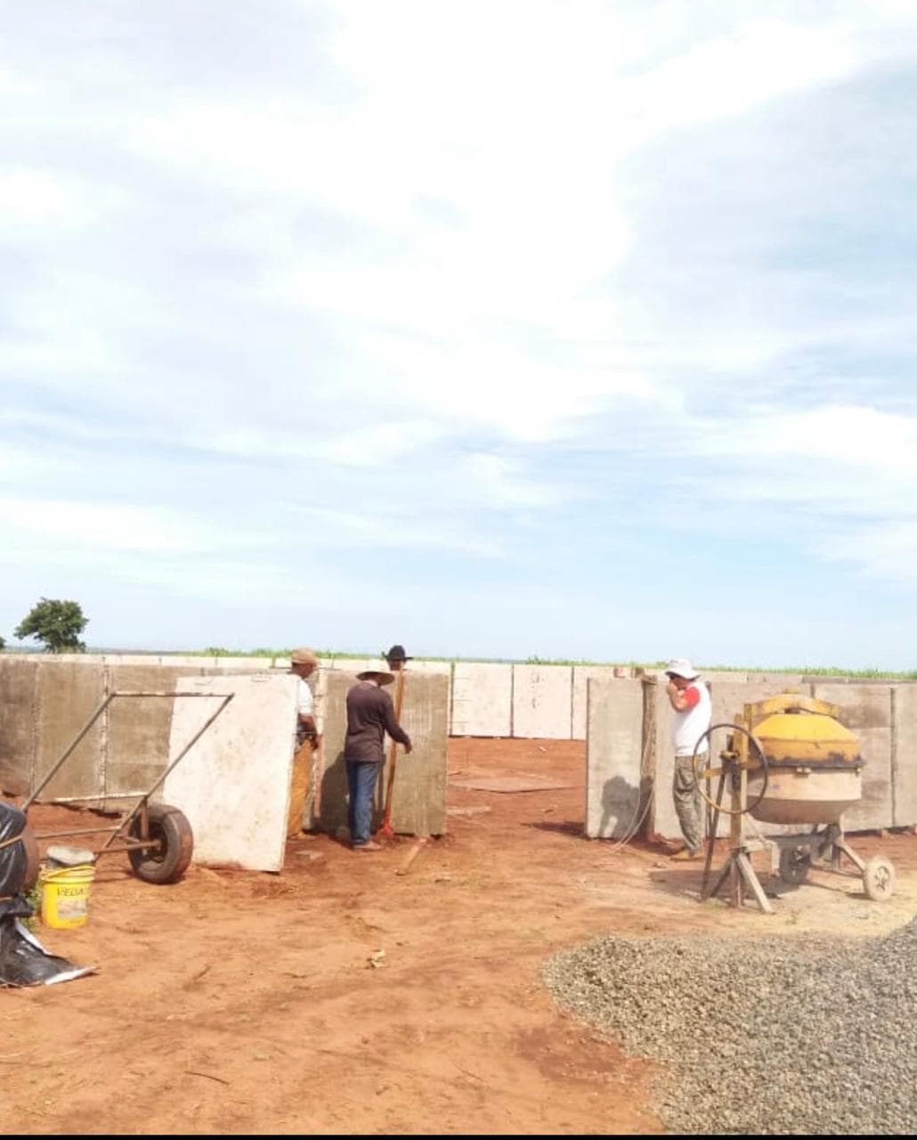 Early construction of the farm's 500,000-liter elevated water storage tank.